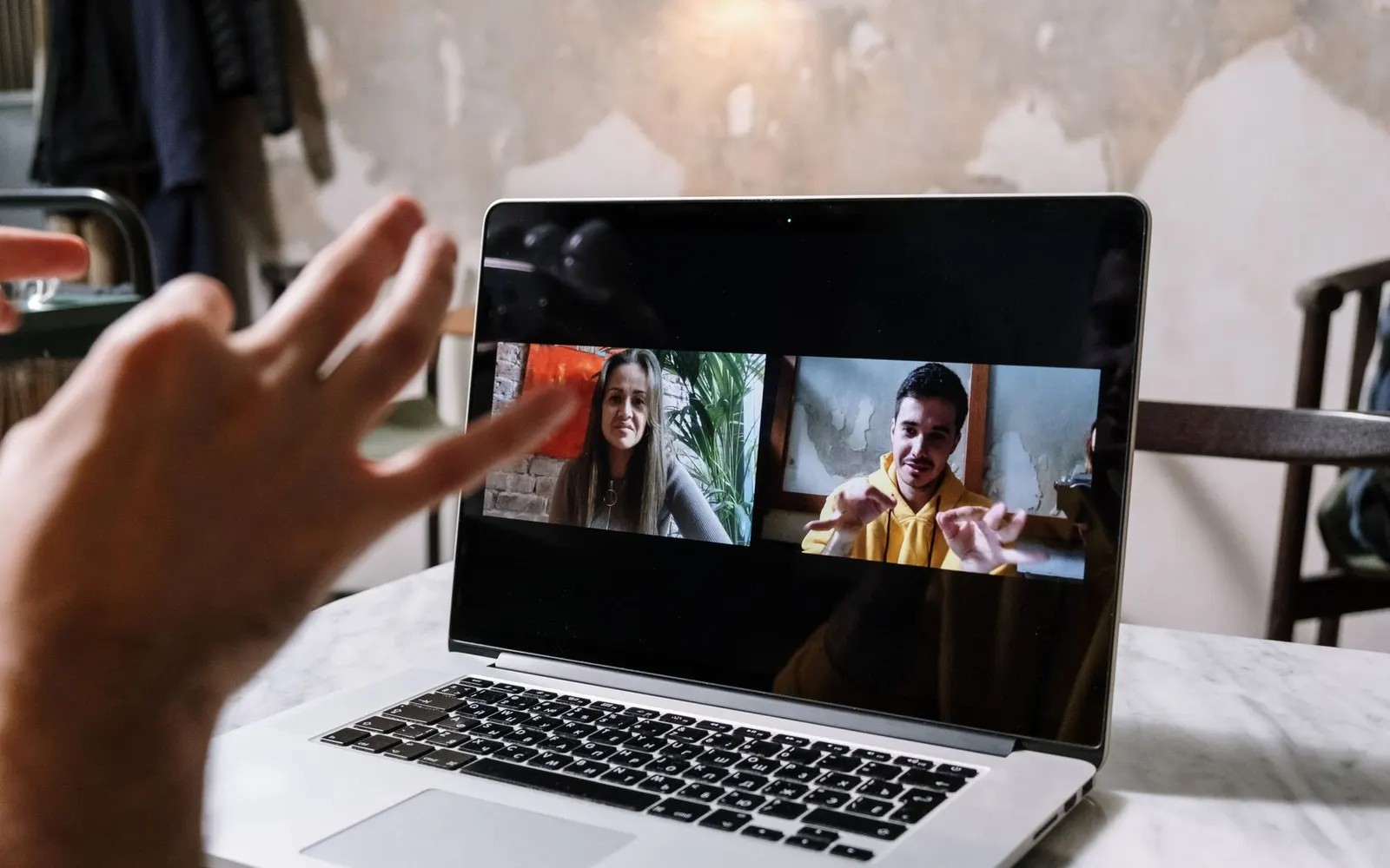A video call on a laptop — walking through setup together on a screen share